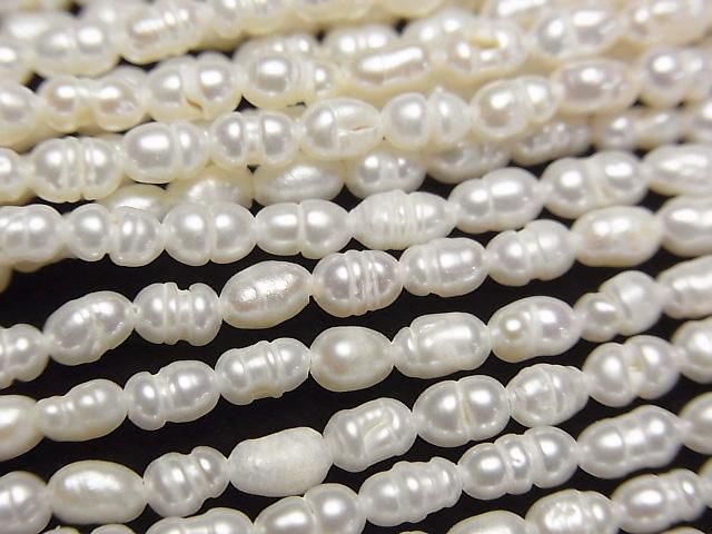 【動画】淡水真珠ケシパールAA ライス~バロック5×3×3mm ホワイト 1連(約33cm)の画像