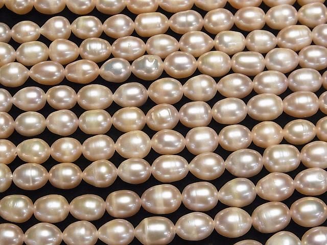 【動画】淡水真珠AA ライス10×7×7mm ピンクオレンジ 1連(約32cm) サムネイル3