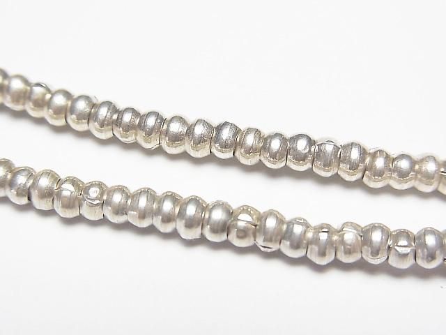 カレンシルバー ロンデル3×3×2mm ホワイトシルバー 10粒の画像