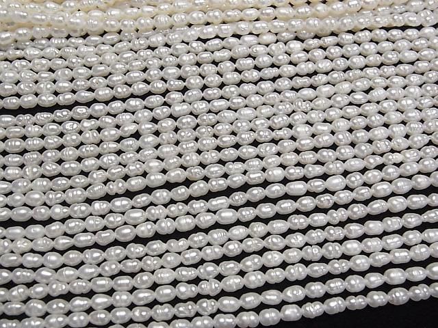 【動画】淡水真珠AA 縞入りライス4×3×3mm ホワイト 1連(約33cm) サムネイル3