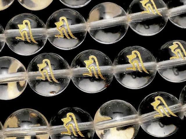 【動画】金色!キリーク(梵字)彫刻入り!クリスタル(合成水晶)AAA ラウンド12mm NO.2 半連/1連(約37cm) の画像