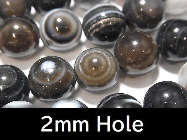 チベットアゲート(天眼石) ラウンド12mm 【2mm穴】 半連/1連(約36cm)の画像