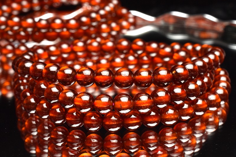 まろやか◇透過性あり オレンジガーネット 5.5mm 3連タイプ